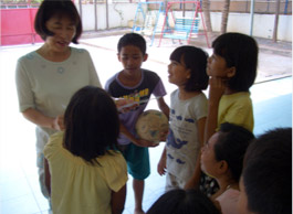 Maeda's playing with children