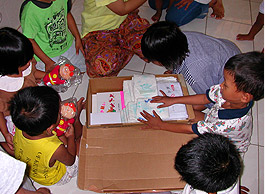 Children receive a gift